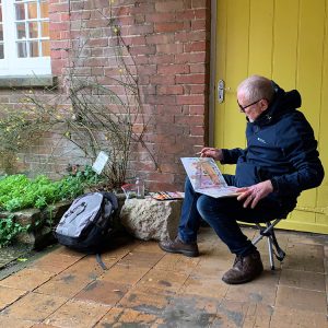Shaun sketching Red House