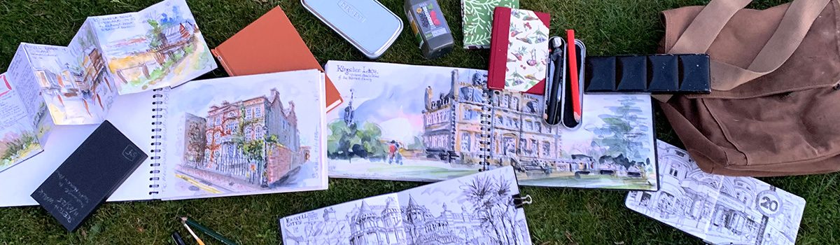 sketchbooks layed out flat