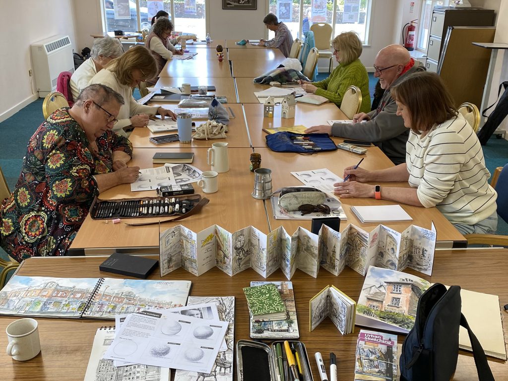 shaun forward delivering urban sketching workshop session to the Reasons for Art group in Wimborne